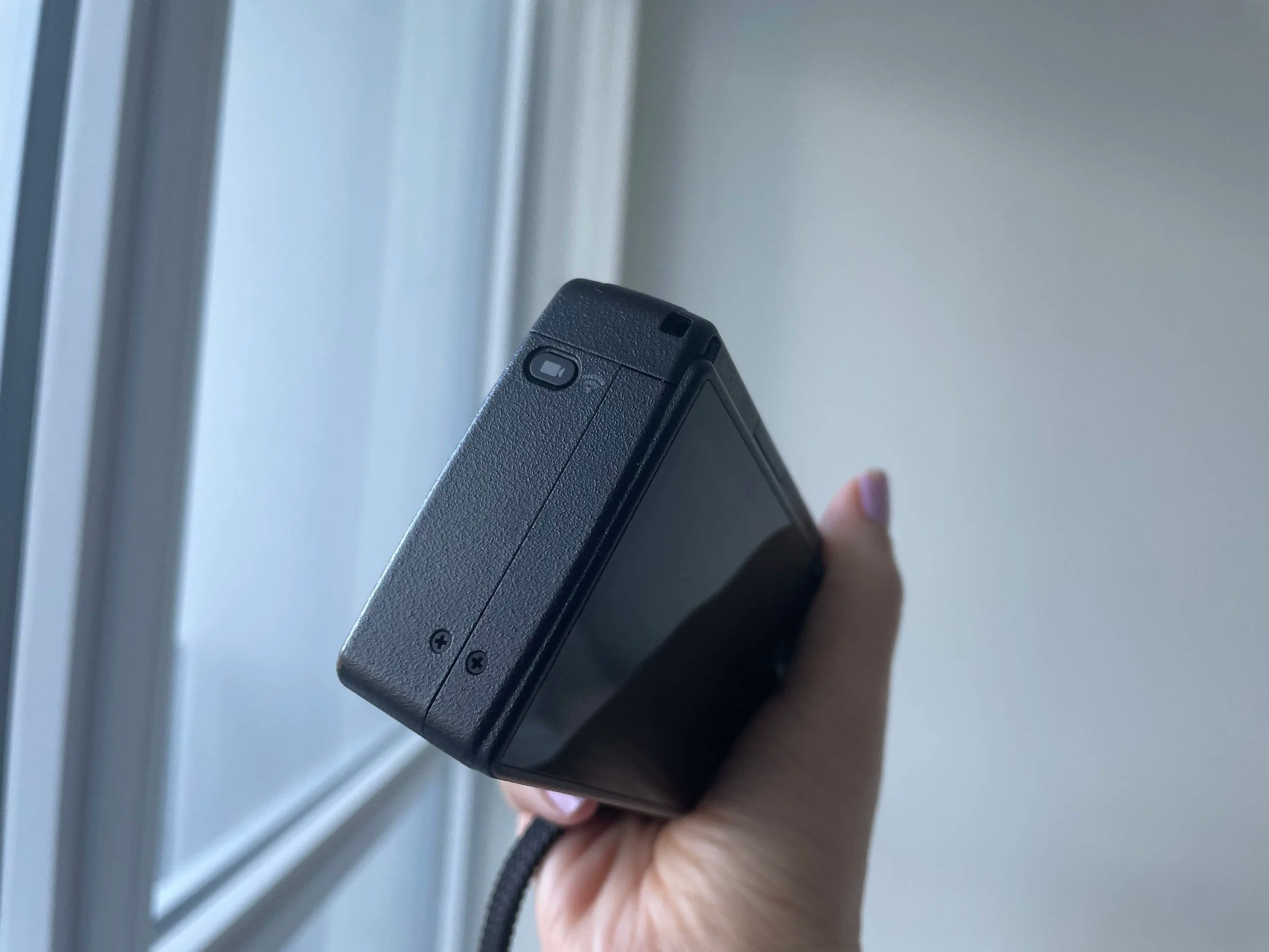 Press the video button on the side of the camera to put your camera in video mode.