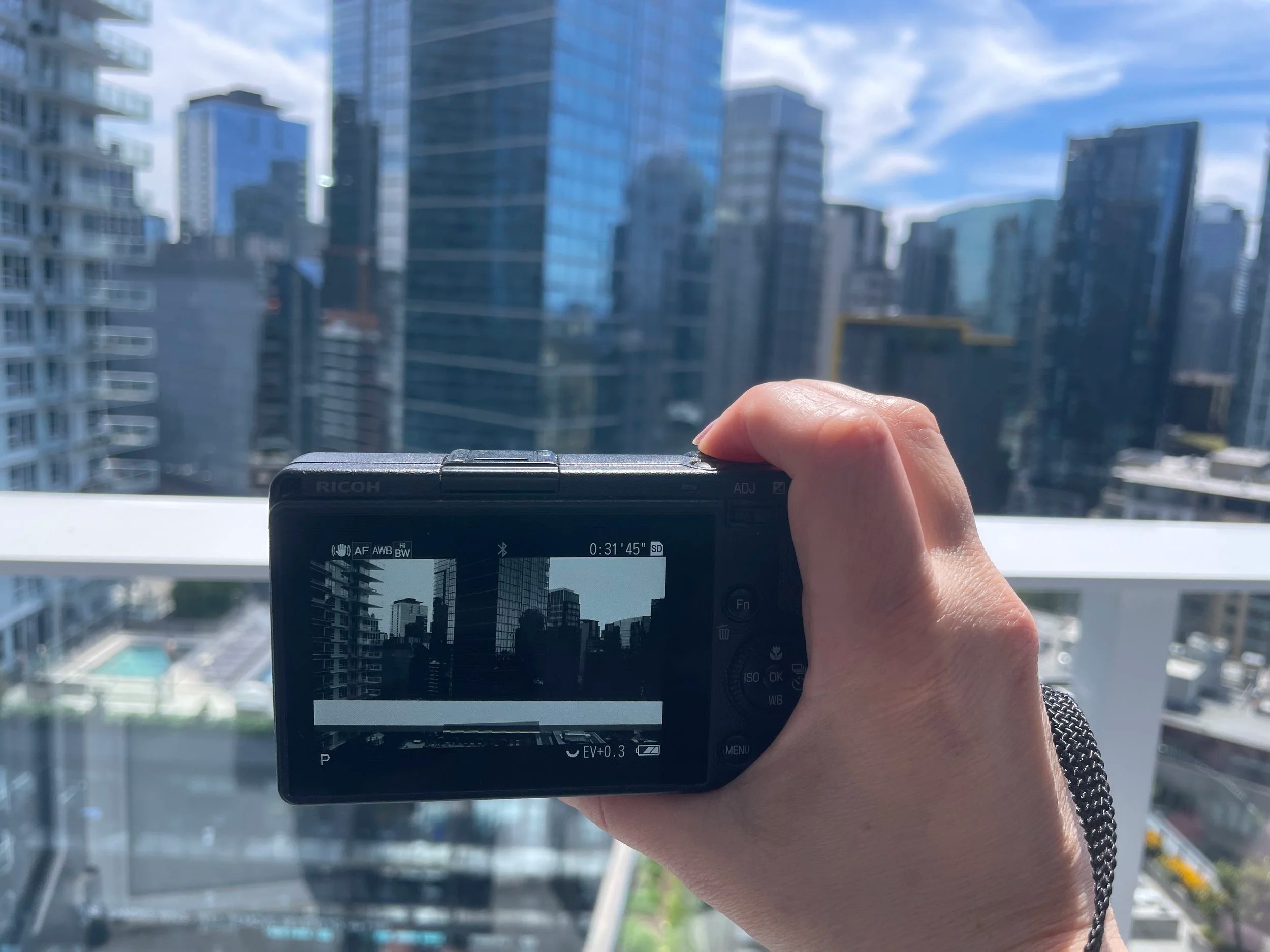 Use the regular shooting button on the top of the camera to start/stop recording your clips.